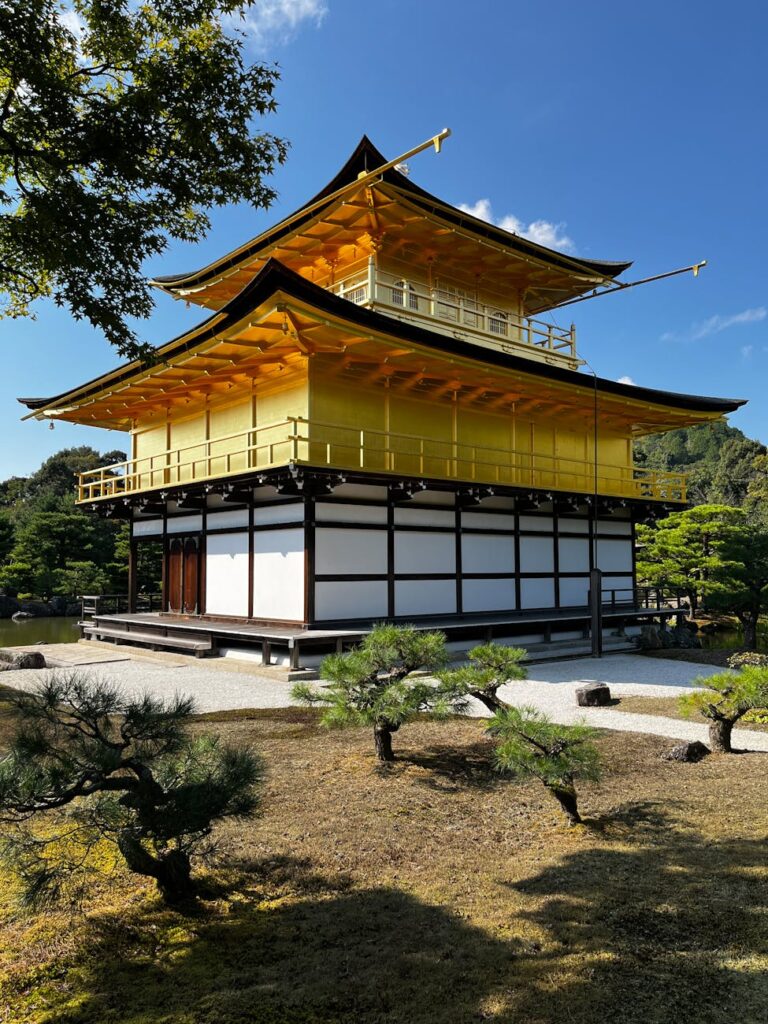kinkaku ji temple in kyoto on a sunny day